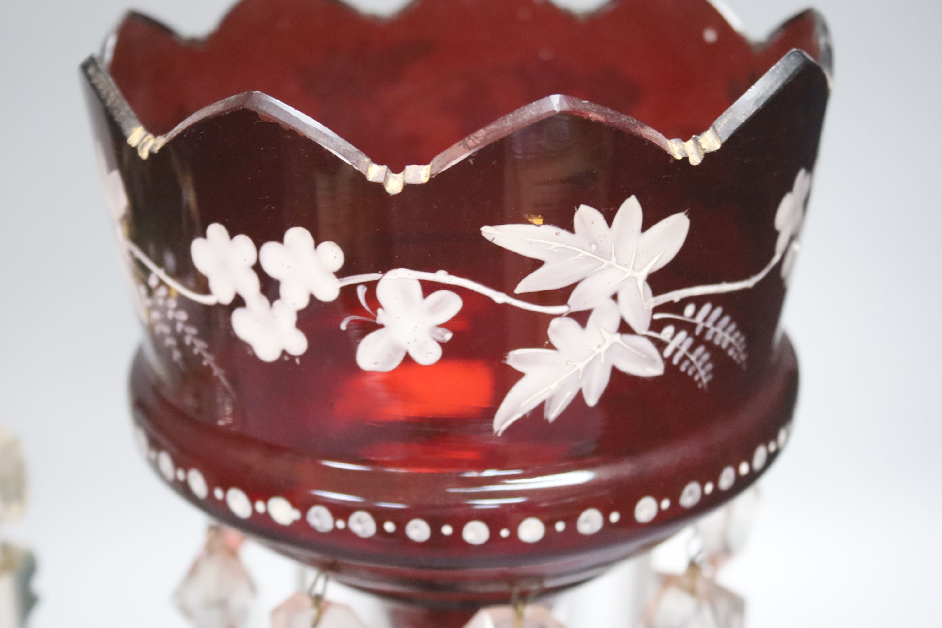 A cranberry glass lustre and a Bohemian overlaid ditto, tallest 33cm